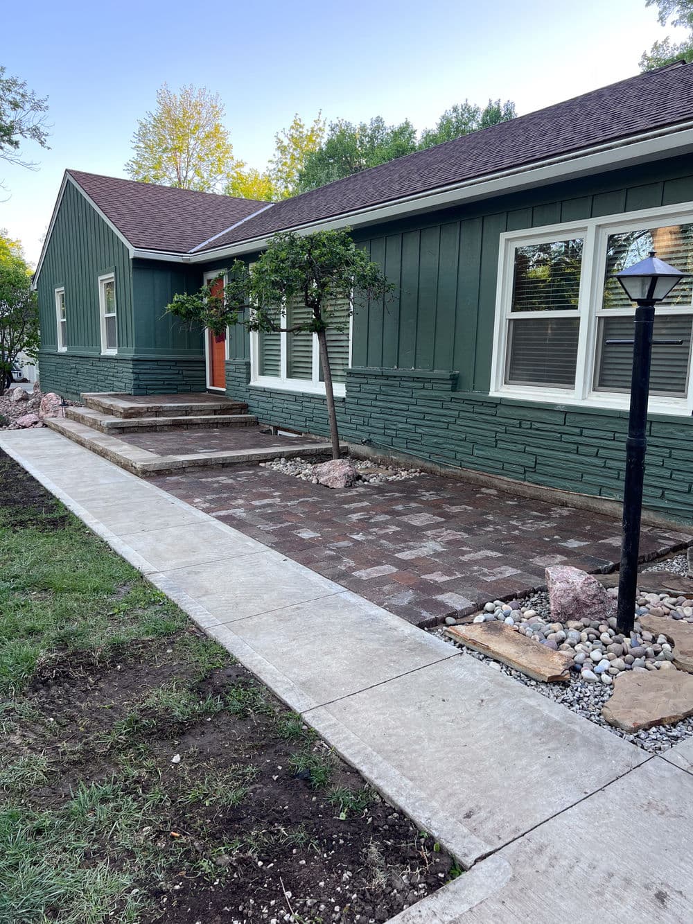 Gallery photos for 3-Tier Custom Paver Patio with Retaining Wall Steps in Mission KS: Image #1