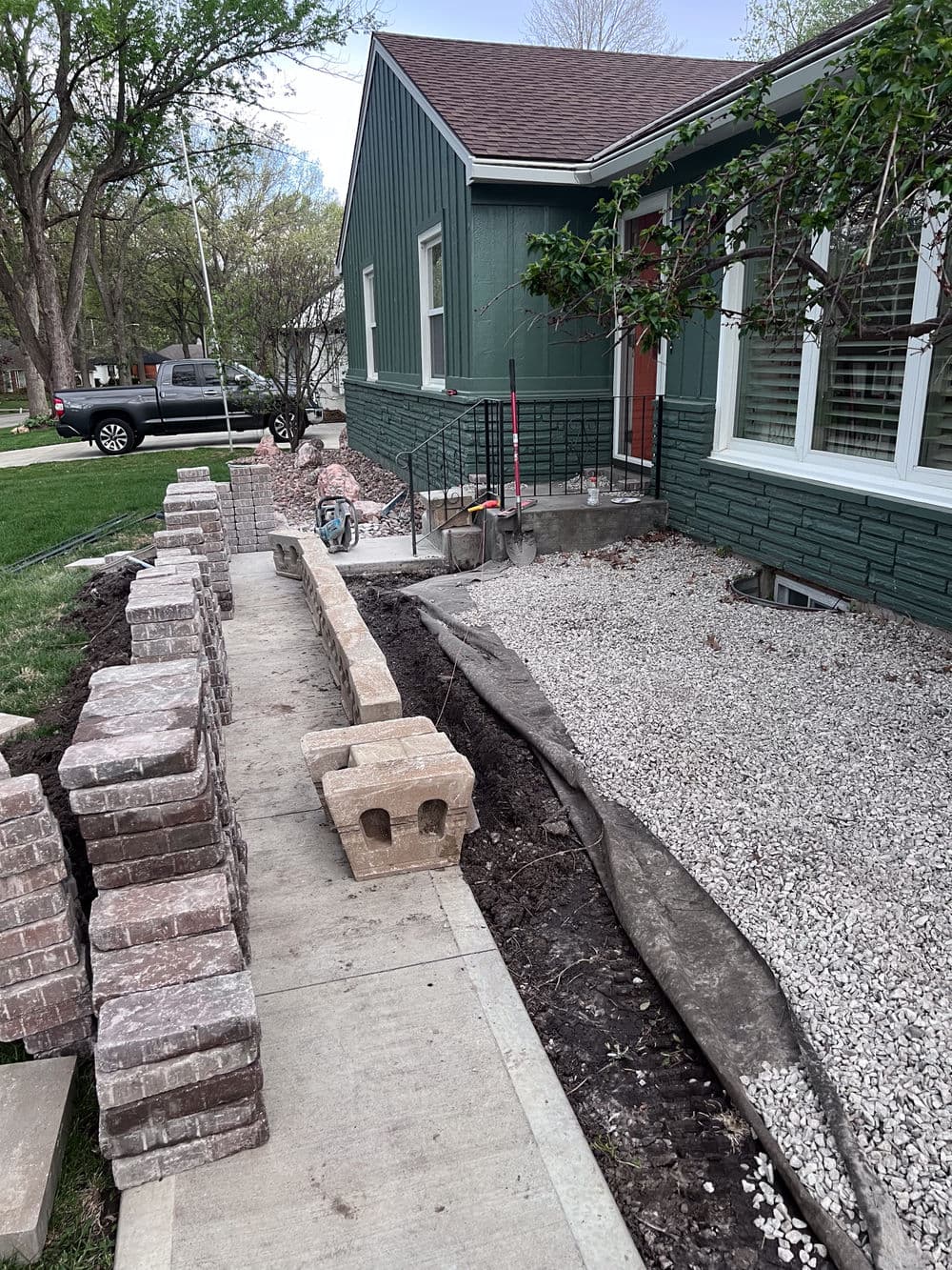 Gallery photos for 3-Tier Custom Paver Patio with Retaining Wall Steps in Mission KS: Image #6