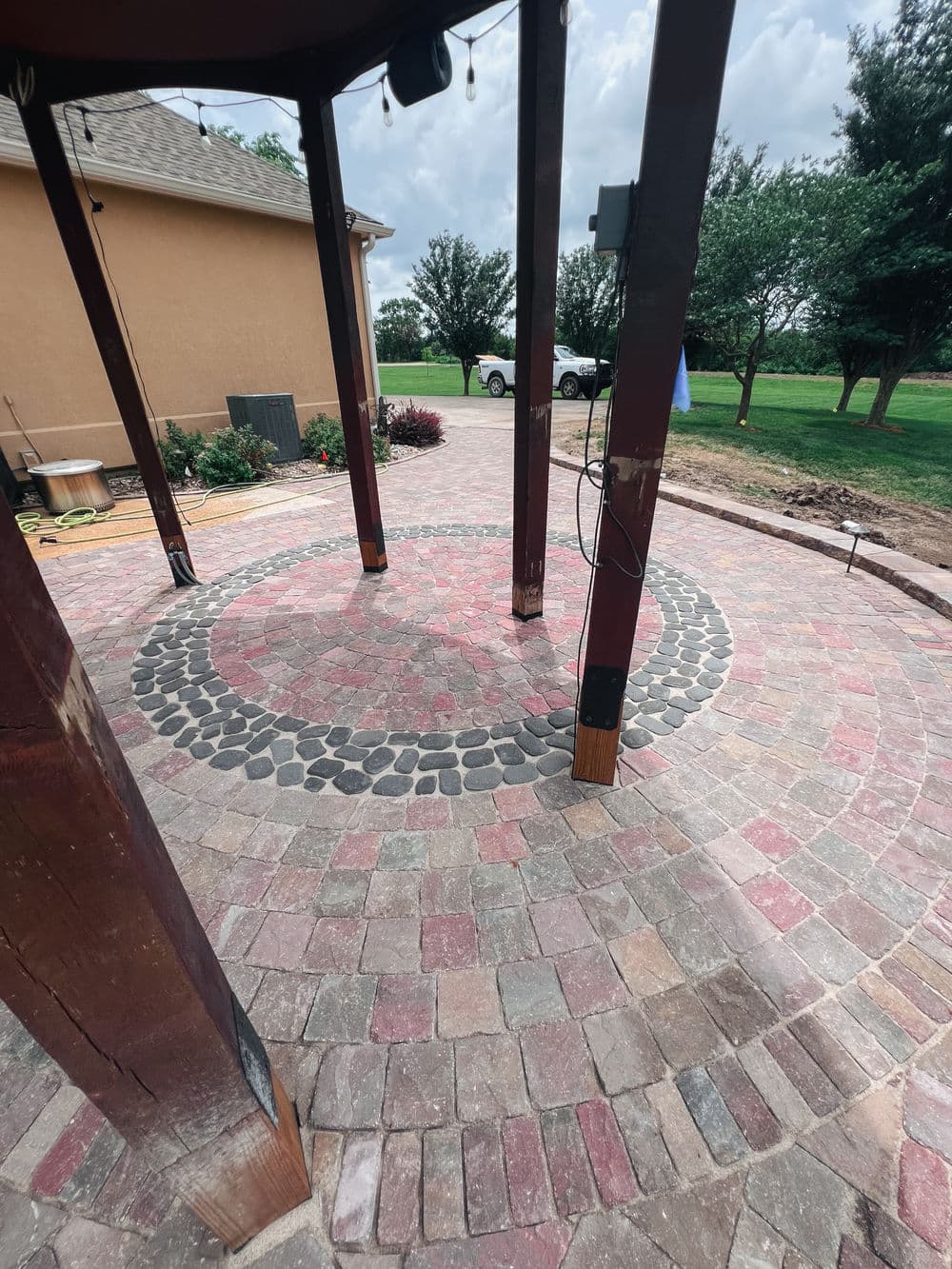 Gallery photos for Three-Tier Paver Patio with Custom Circle Design in Topeka: Image #1