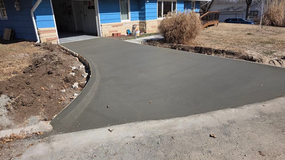 Cracked Driveway Replaced with Fresh Concrete in Overland Park image