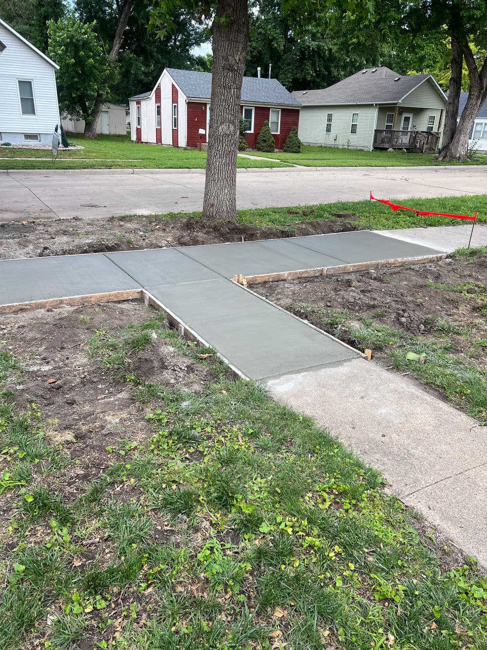 Gallery photos for Cracked Sidewalk Replaced With Fresh Concrete in Wamego: Image #1