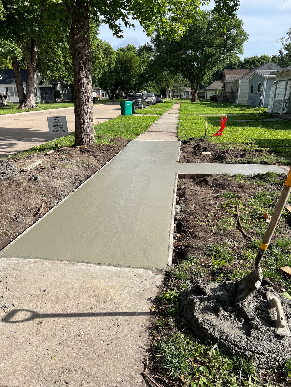 Cracked Sidewalk Replaced With Fresh Concrete in Wamego image